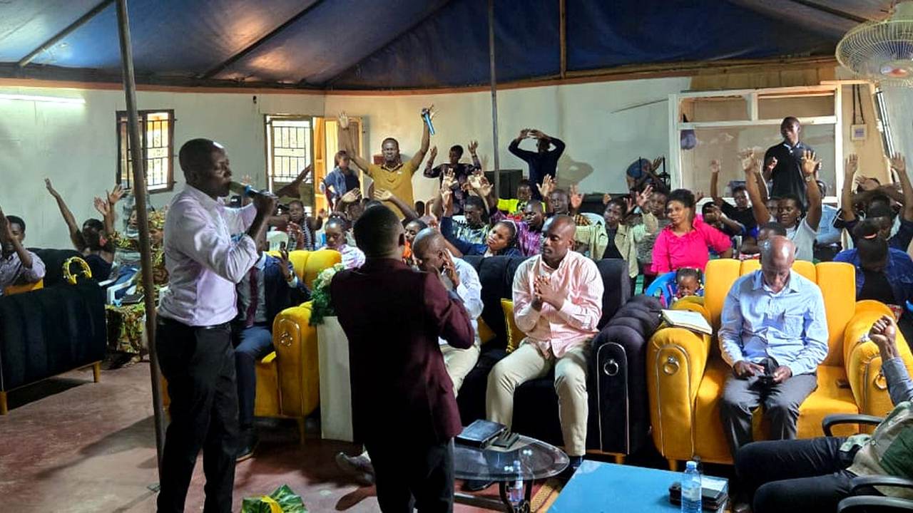 The congregation worshipping together today