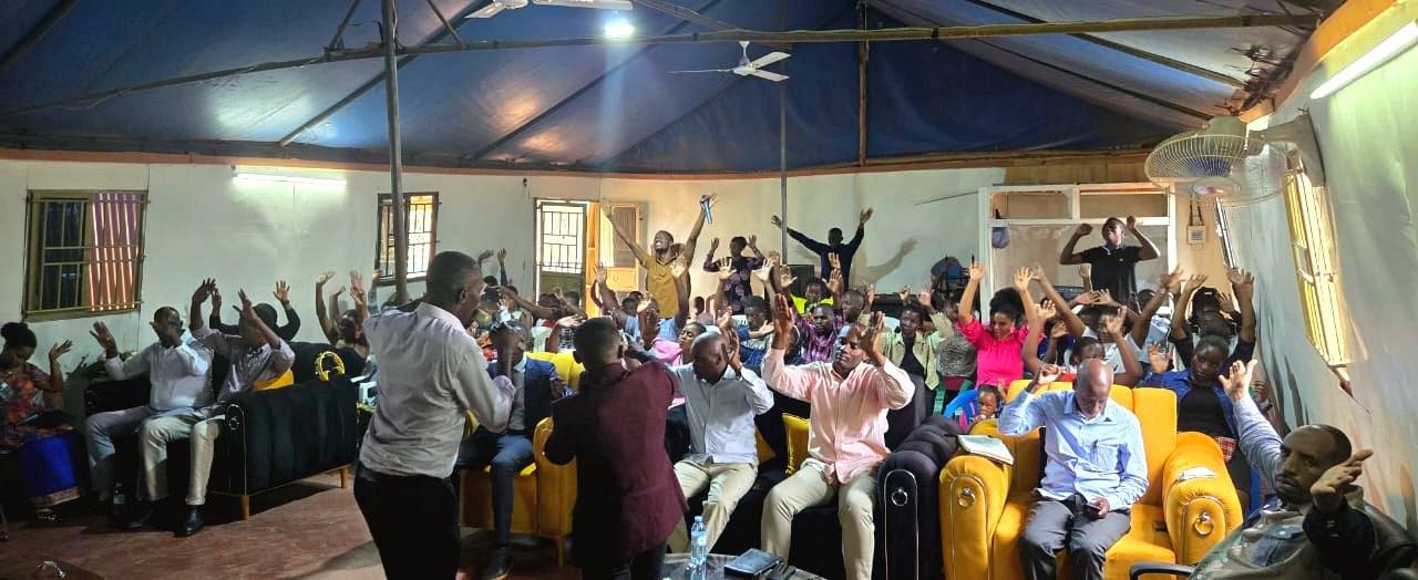 The congregation gathered in the house